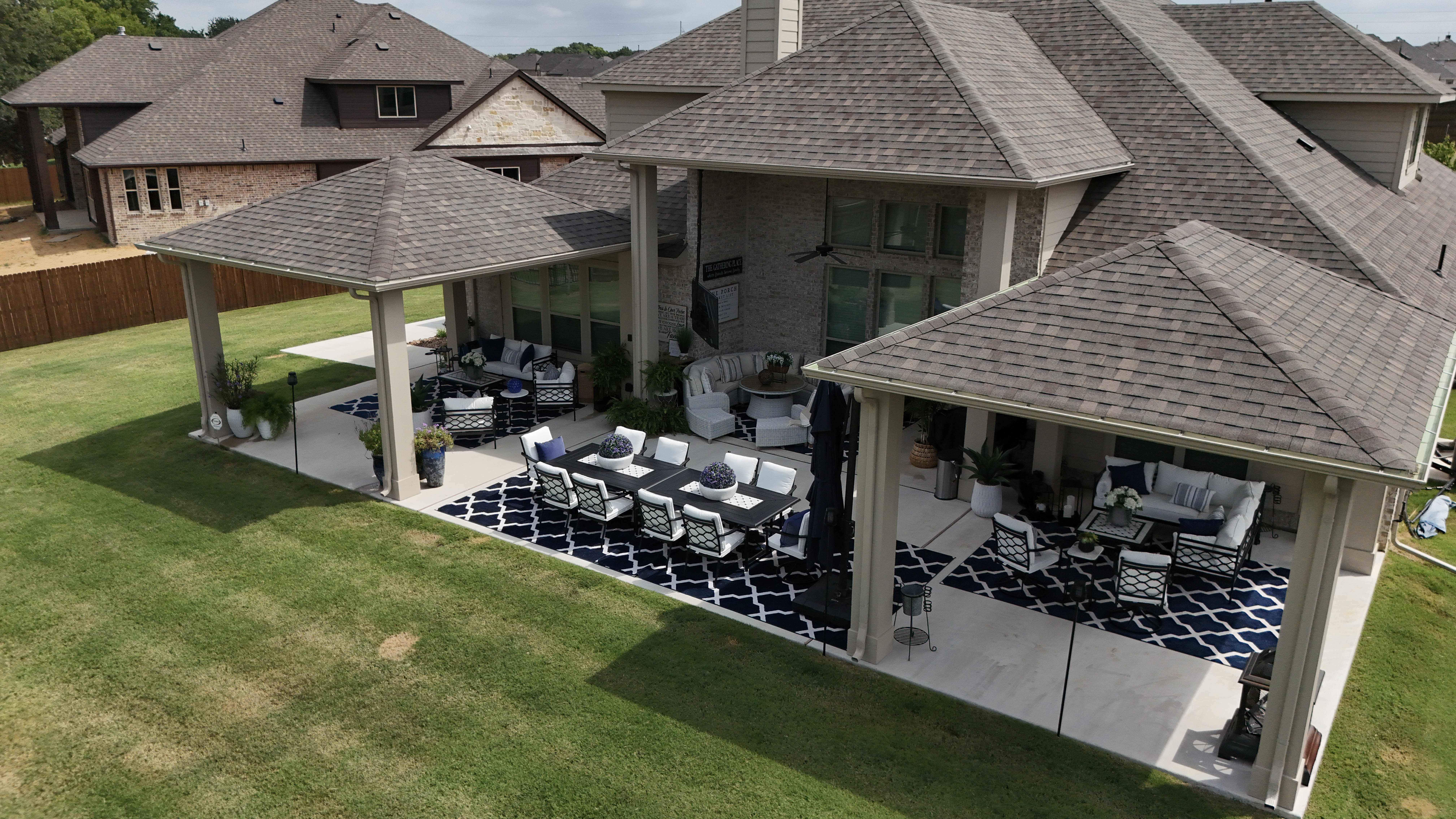 Triple Tiered-Pergola with Outdoor TV Installations by Centennial Contracting & Roofing
